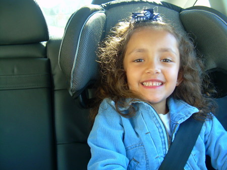 Nina in her car seat.