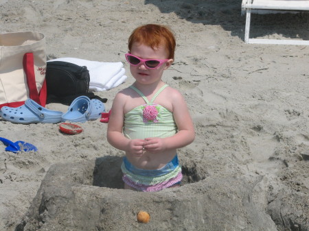 Emma "s first time playing in the sand at Myrtle