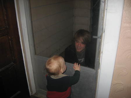 Brandon & Devyn playing through the door