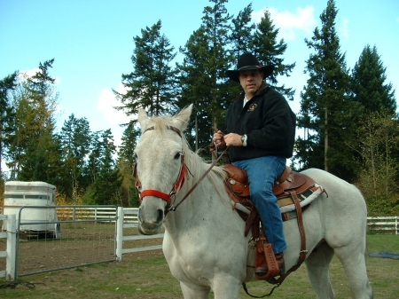 At home giving horses a work out.