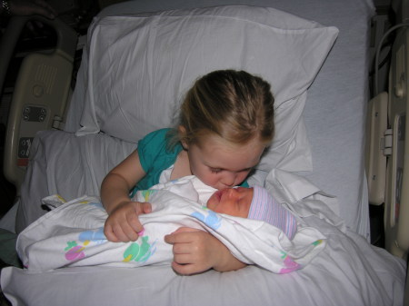 Sierra welcoming her new baby sister into the world.