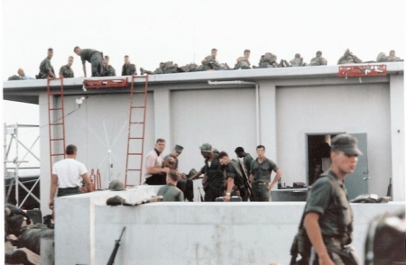 Doug (center) on the roof of the Embassy, Saigon, Vietnam 1975
