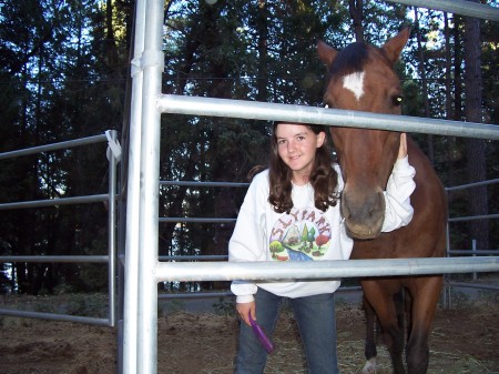 My daughter Nicole, with "Echo" registered quarter horse.