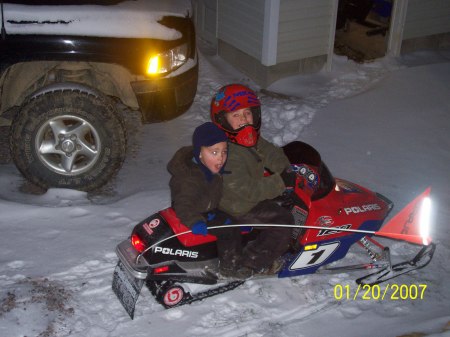 my boys on thier snowmobile