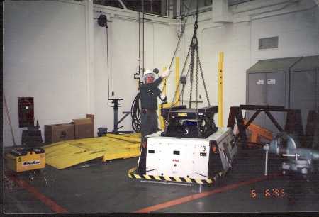 Me working on Computer controlled Forklift (AGV)