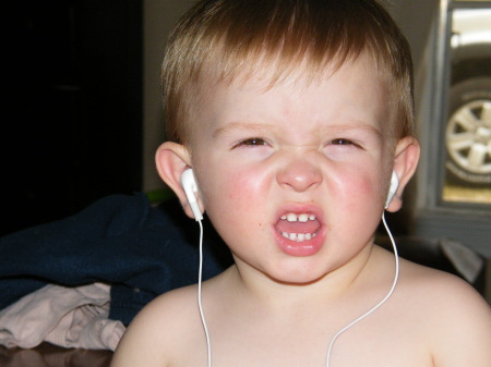 Grayson listening to tunes on the iPod