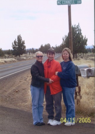 With sisters Bobbi Jo (BJ) left, and Pearlette (Toni) on right.  Standing on the road (in Tumalo) named after our family.