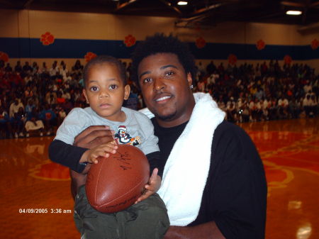 My son Jay and Tony Brown of the Tenn. Titans.  He won a autograph football from the players on the team.(Celebrity Basketball Game April "07")