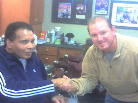 Shaking the Champ's hand at V's Barbershop