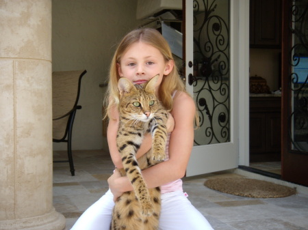 my daughter, Kendall w/ my savannah, Hummer