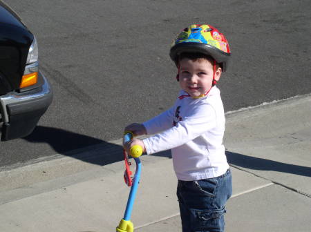 Robert with his new scooter from Santa