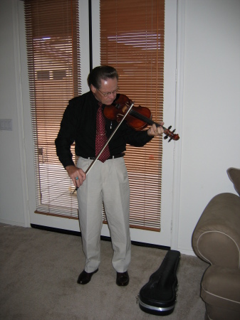 Ken Playing the Violin during Church