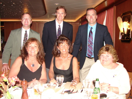 Our daughters Pat & Jeanne (seated left & center), son Charles Jr. (standing right) and their spouses on the cruise