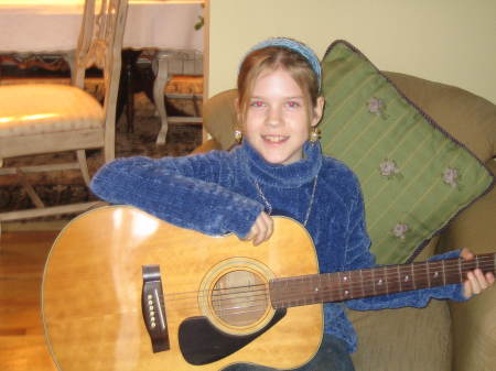 Kayla playing guitar