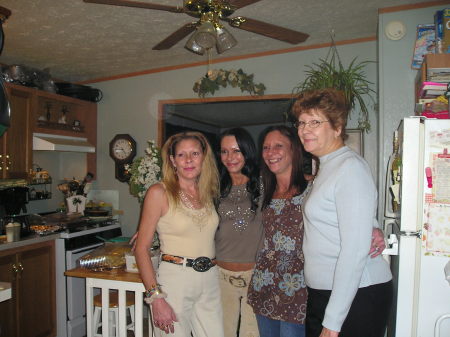 this is me with linda, kim and our mother, I'm the one with the darkest hair