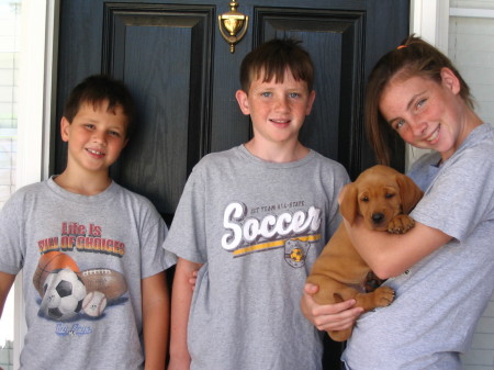 Scott, Nicholas, and Kacie with our new baby, Cooper!