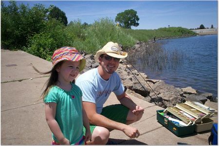 Our granddaughter, Isabelle, fishing with our son, Tim.  Pinetop, AZ, 7/2007