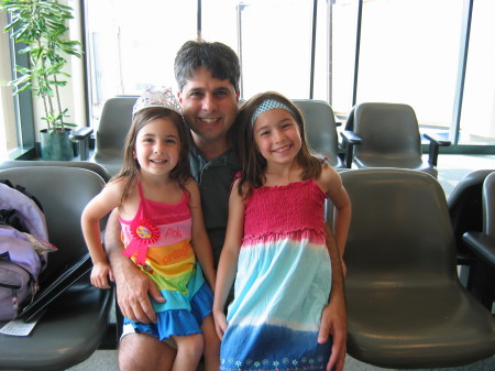 Alexandra, Greg and Kaylee at the airport.