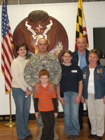 Scott receiving the Meritorious Service Medal