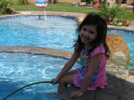 Kaylee enjoying our pool