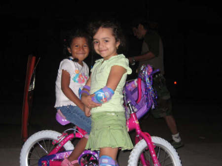 Dayanara my youngest daughter.riding her bike.