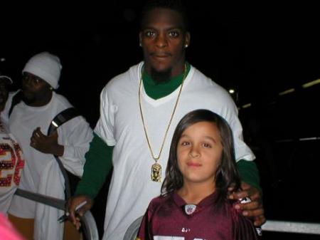 My son Adrian with Clinton Portis From the Washington Redskins