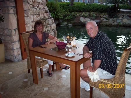 My husband and I having dinner in Aruba