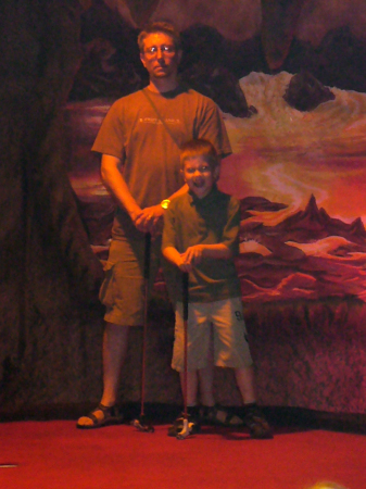 Father and son golfing in Hell...