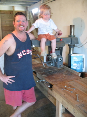 Alejandro helping Dad build the new workshop