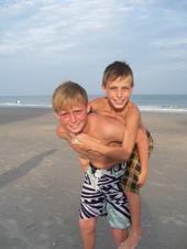 Piggy Back Ride On The Beach