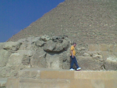 Boyfriend Jim walks on one of the pyramids.
