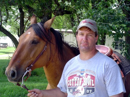 My husband, John, and his gelding, Buck