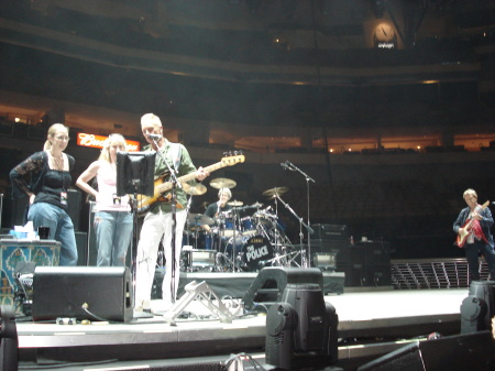 Me (in the pink) singing with the Police in June 07