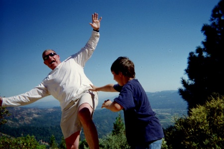 Robbie trying to push Daddy off Mount St. Helena