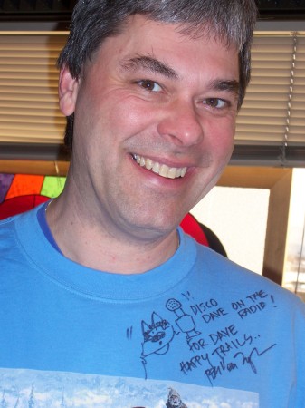 With shirt signed by Alaskan artist Jon Van Zyle