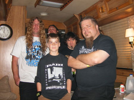 my son jacob on the tour bus with Pain Principle