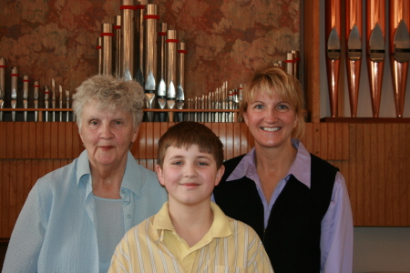 Grandma, Chase and Mom at  first communion.