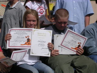 Benno Jr. & Desirei Graduating 5th Grade Aug. 2004
