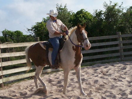 My husband Manny doing what he loves!!!!!!Training horses