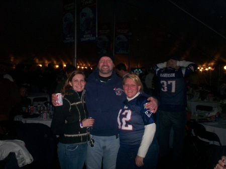 me, Lyndon Byers of the Bruins, and his girl at a Patriots game