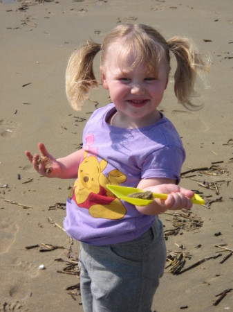 Angelina enjoying the sand