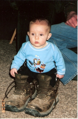 Lucas in daddy's boots, 5 months old