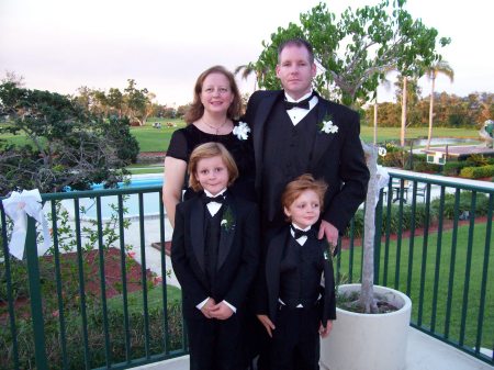 Me, my husband, Scott and our kids, Ryan & Andy (at a wedding)