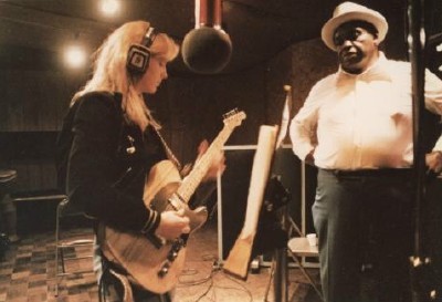 ADDIE and Willie in the studio working on a guitar part