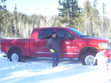 Cutting our tree down X-mas 2006 Ceader breaks Utah .I just did 10-donoughts in the Snow...The Kids loved it!
