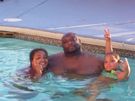 MY DAUGHTERS AND I CHILLIN IN OUR POOL