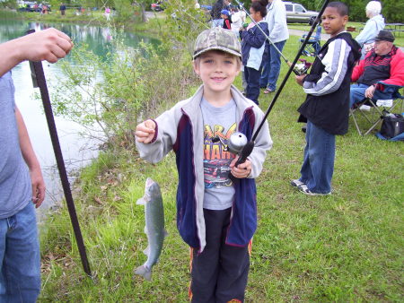 kyle withhis first rainbow trout