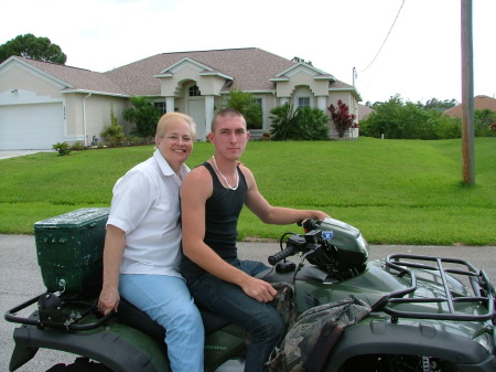 my son Robert & my mom on his 4 wheeler