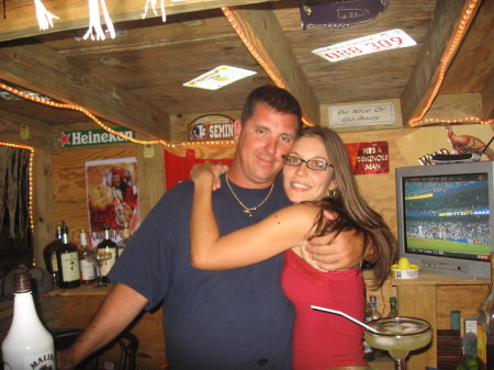 me and the wife at our tiki bar