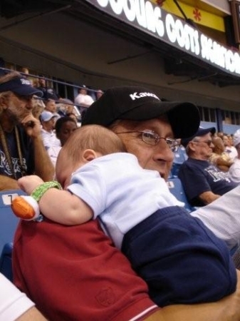 wyatt and grandpa norm at the ray's games